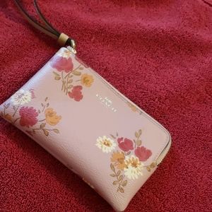 Coach pink flowered wristlet
